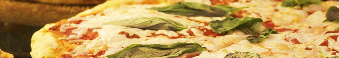 Eating Italian Pizza at Little Gio's Pizza restaurant in New York, NY.